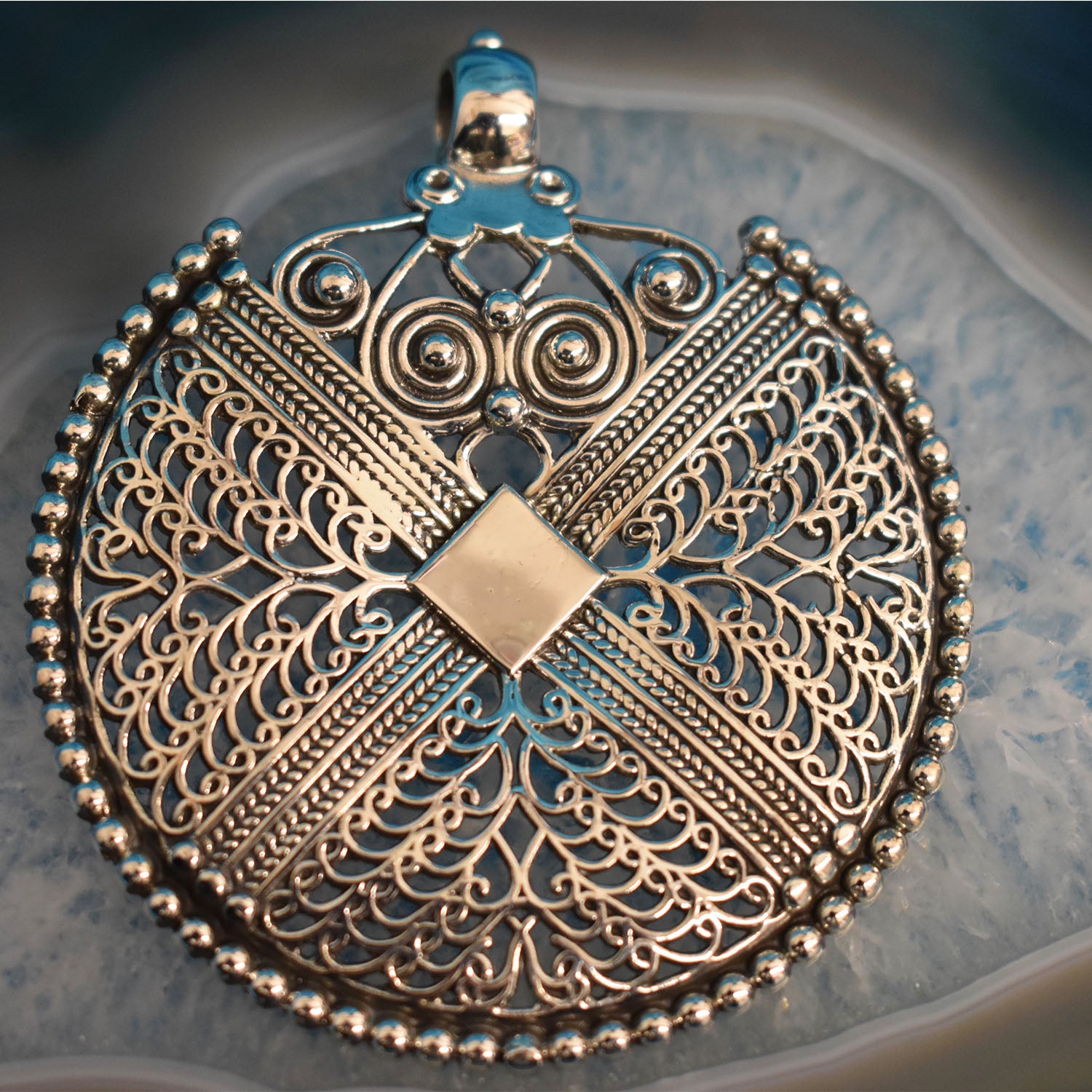 Sterling silver hot sale medallion pendant