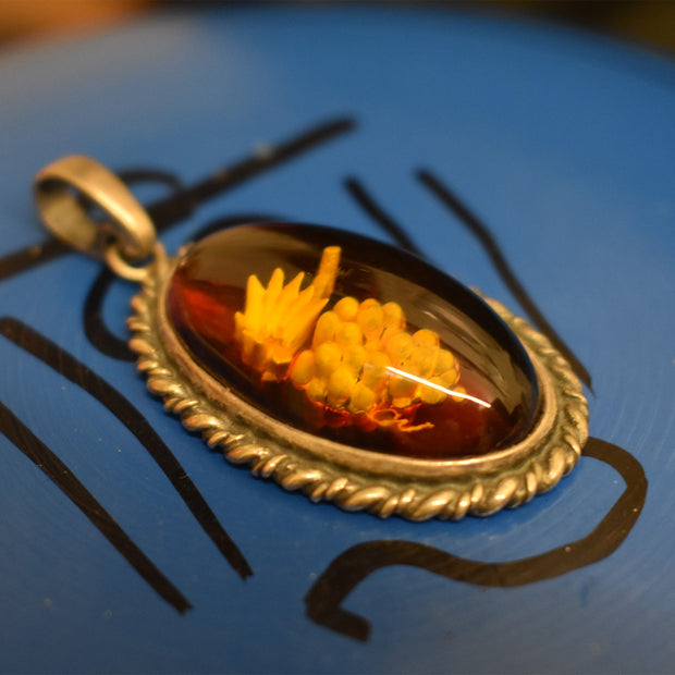 Ganesha Handicrafts, Cameo Amber, Buy Amber Cameo Online, Buy Amber Cameo, Cameos in Amber. 